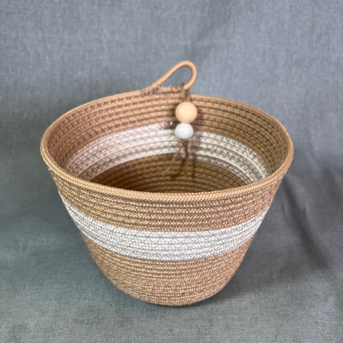 Taupe and white striped rope planter with wooden bead detail